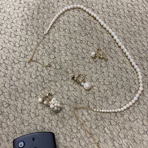 14k pearl necklace and than the darling are pearls but gold plated